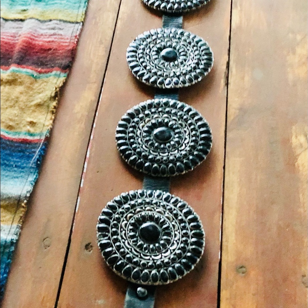 Black round concho belt
